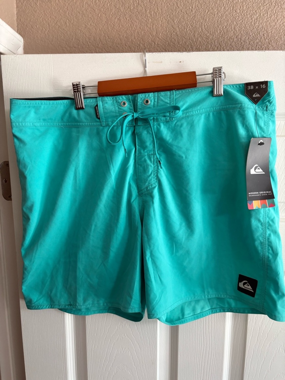 Quiksilver NWT blue swim trunks pockets tie waist size 38